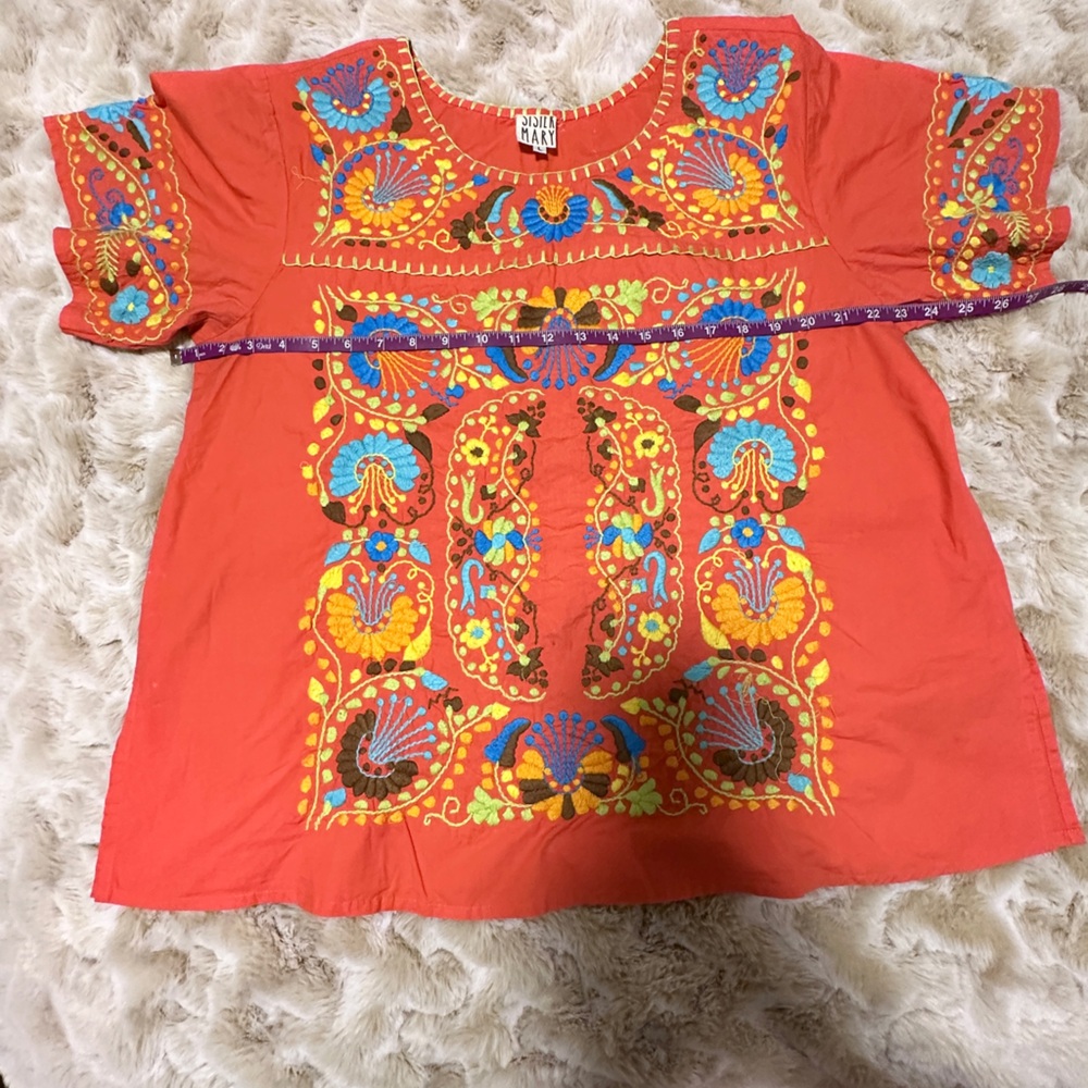 Sister Mary Top. Vibrant coral with multi colored embroidery.